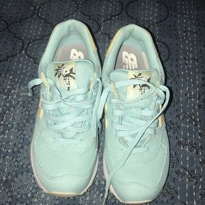 New Balance 574 sneakers.